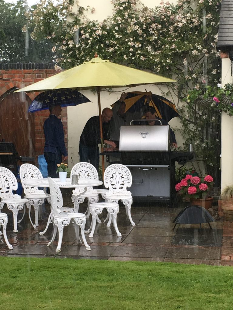 The English Summer and being British! Determined to carry on with the BBQ - in the pouring rain! 